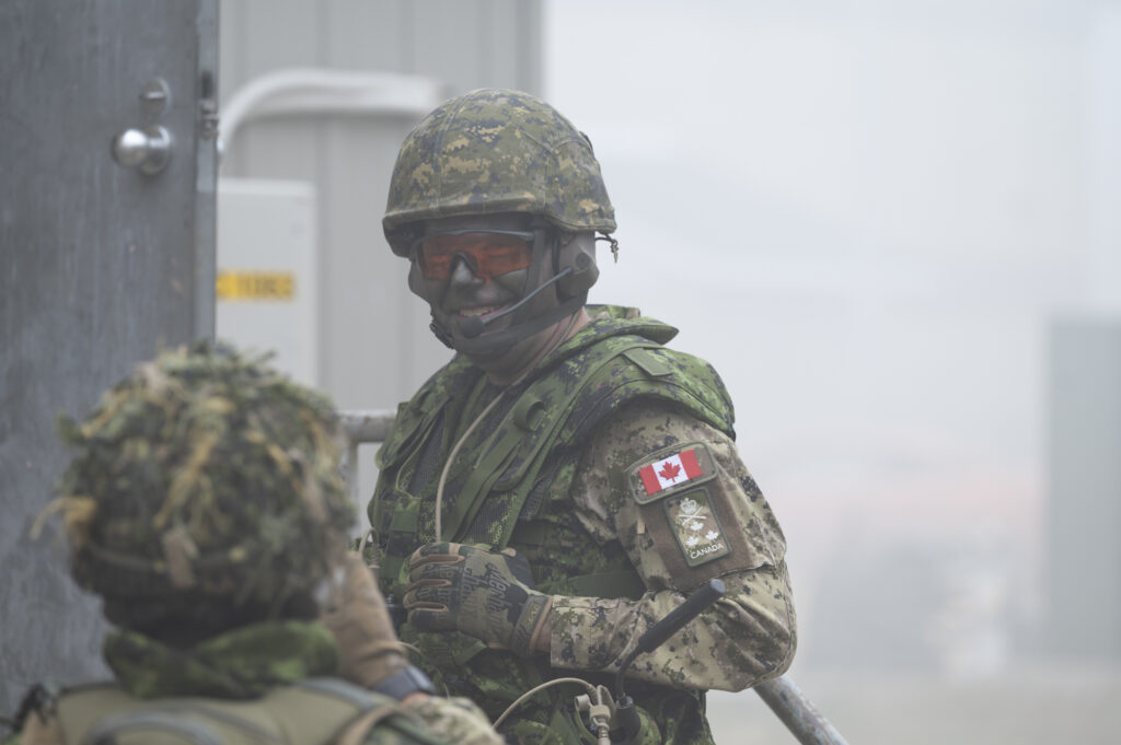 Stakeholders participate in Urban Ops Warfare Demo, alongside The 3rd Battalion Royal Canadian Regiment, during Collaborative Spirit, at CFB Petawawa, on September 26, 2025, to see how Urban Warfare is conducted by Canadian Soldiers. Photo credit to Cpl Surphlis, Canadian Armed Forces.