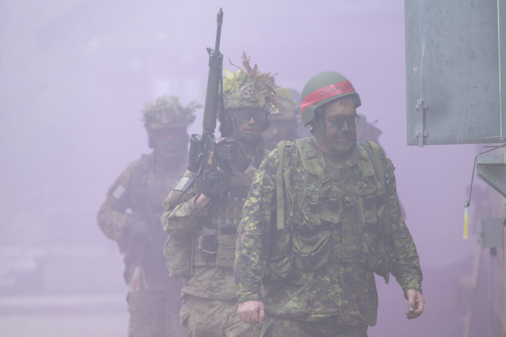 Stakeholders participate in Urban Ops Warfare Demo, alongside The 3rd Battalion Royal Canadian Regiment, during Collaborative Spirit, at CFB Petawawa, on September 26, 2025, to see how Urban Warfare is conducted by Canadian Soldiers. Photo credit to Cpl Surphlis, Canadian Armed Forces.