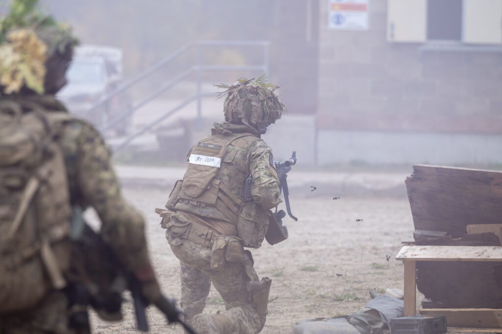 Stakeholders participate in Urban Ops Warfare Demo, alongside The 3rd Battalion Royal Canadian Regiment, during Collaborative Spirit, at CFB Petawawa, on September 26, 2025, to see how Urban Warfare is conducted by Canadian Soldiers. Photo credit to Cpl Surphlis, Canadian Armed Forces.